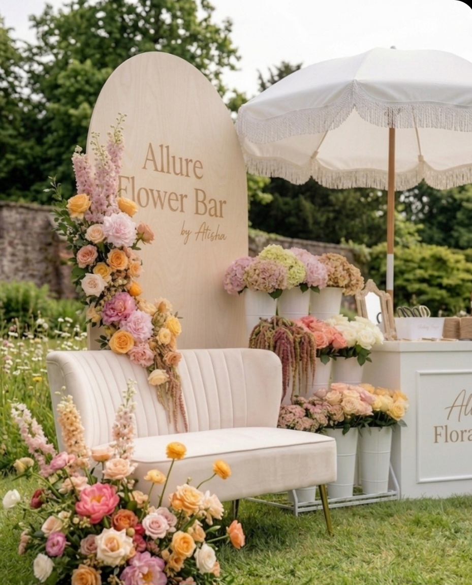 Allure Flower Bar garden setup with pastel blooms and lounge seating